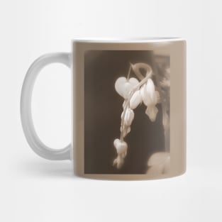 white bleeding hearts sepia Mug